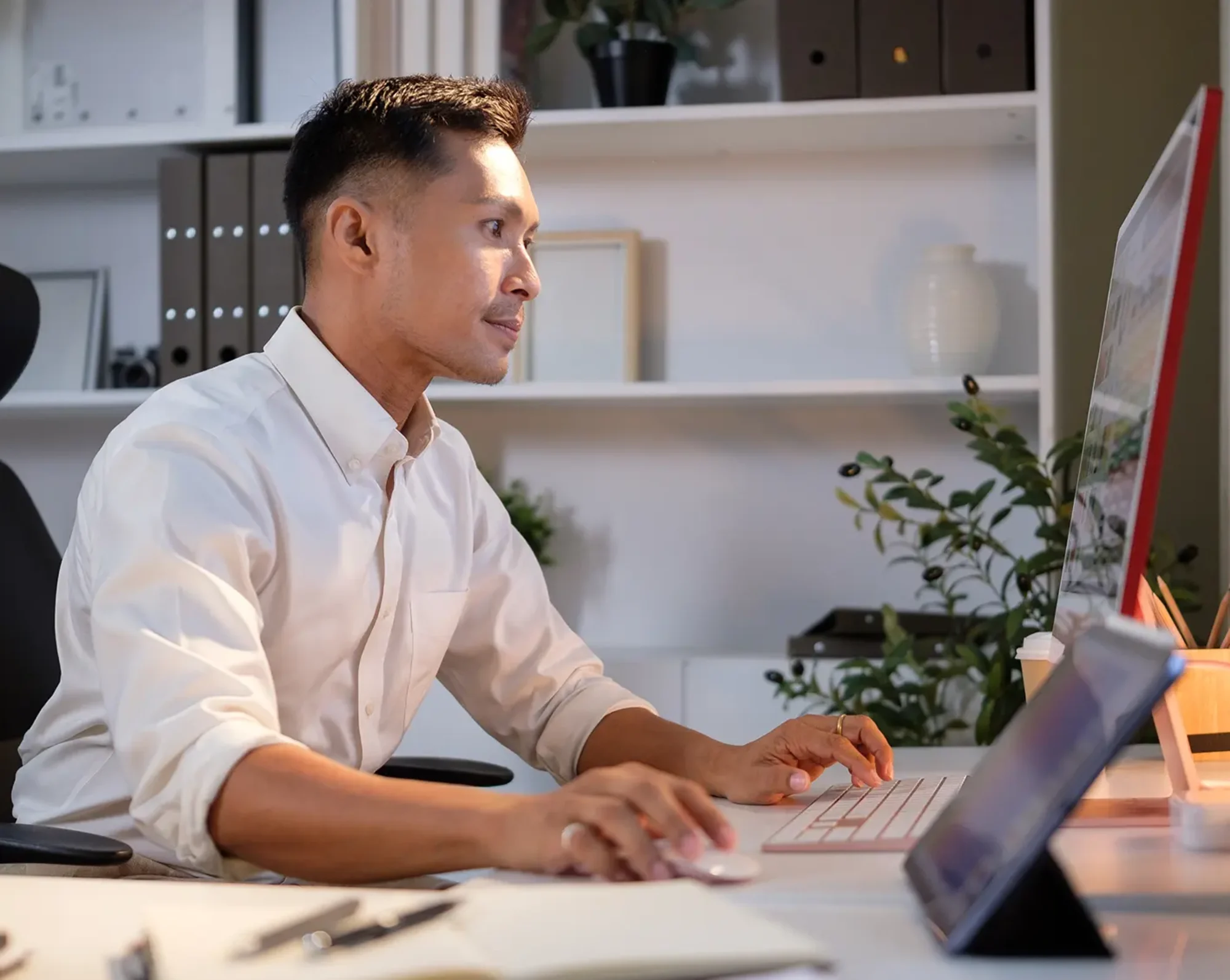 employee looking up transit parking benefits on computer