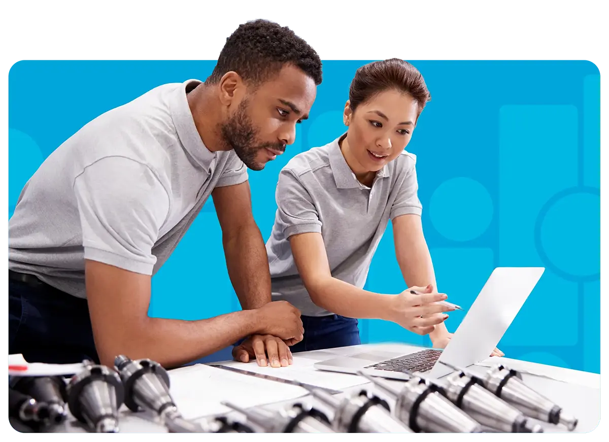 manufacturing workers looking over instructions