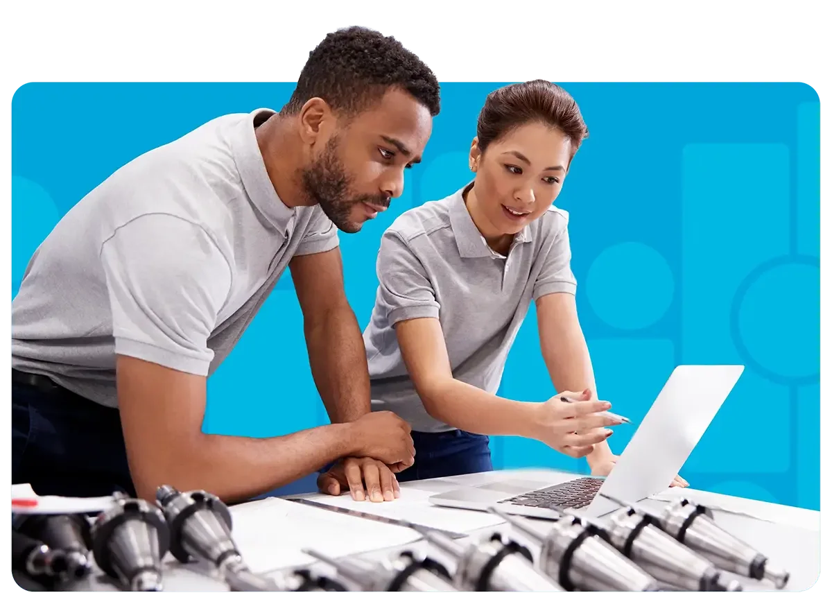 manufacturing workers looking over instructions