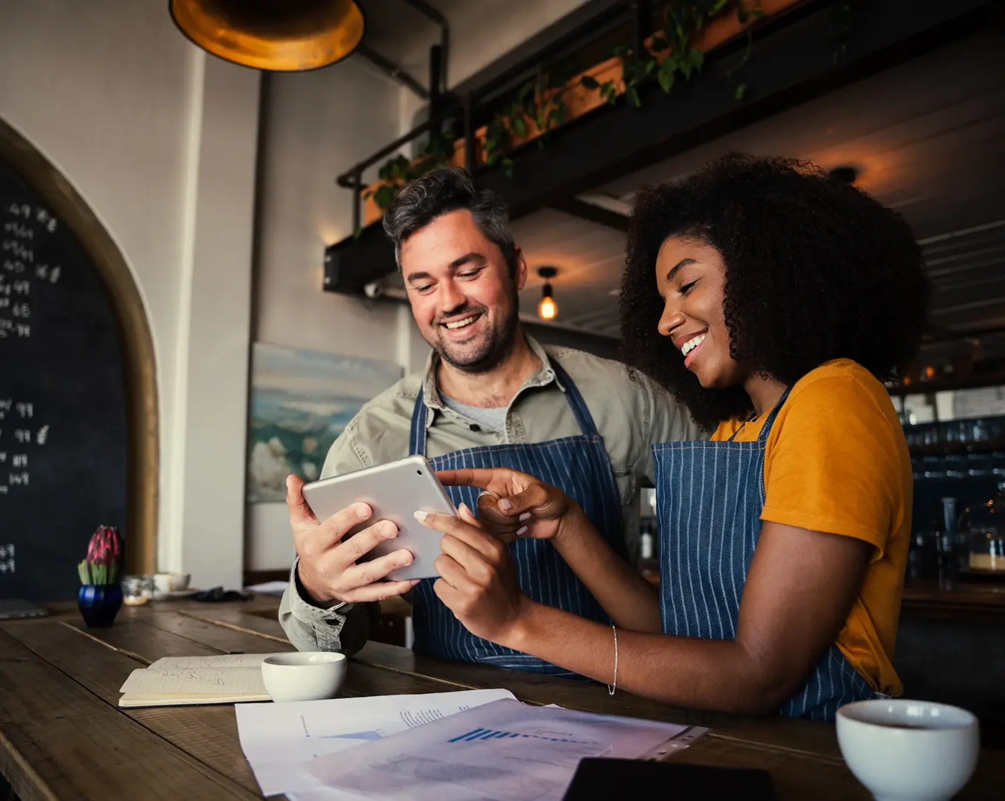 employees on tablet researching state continuation