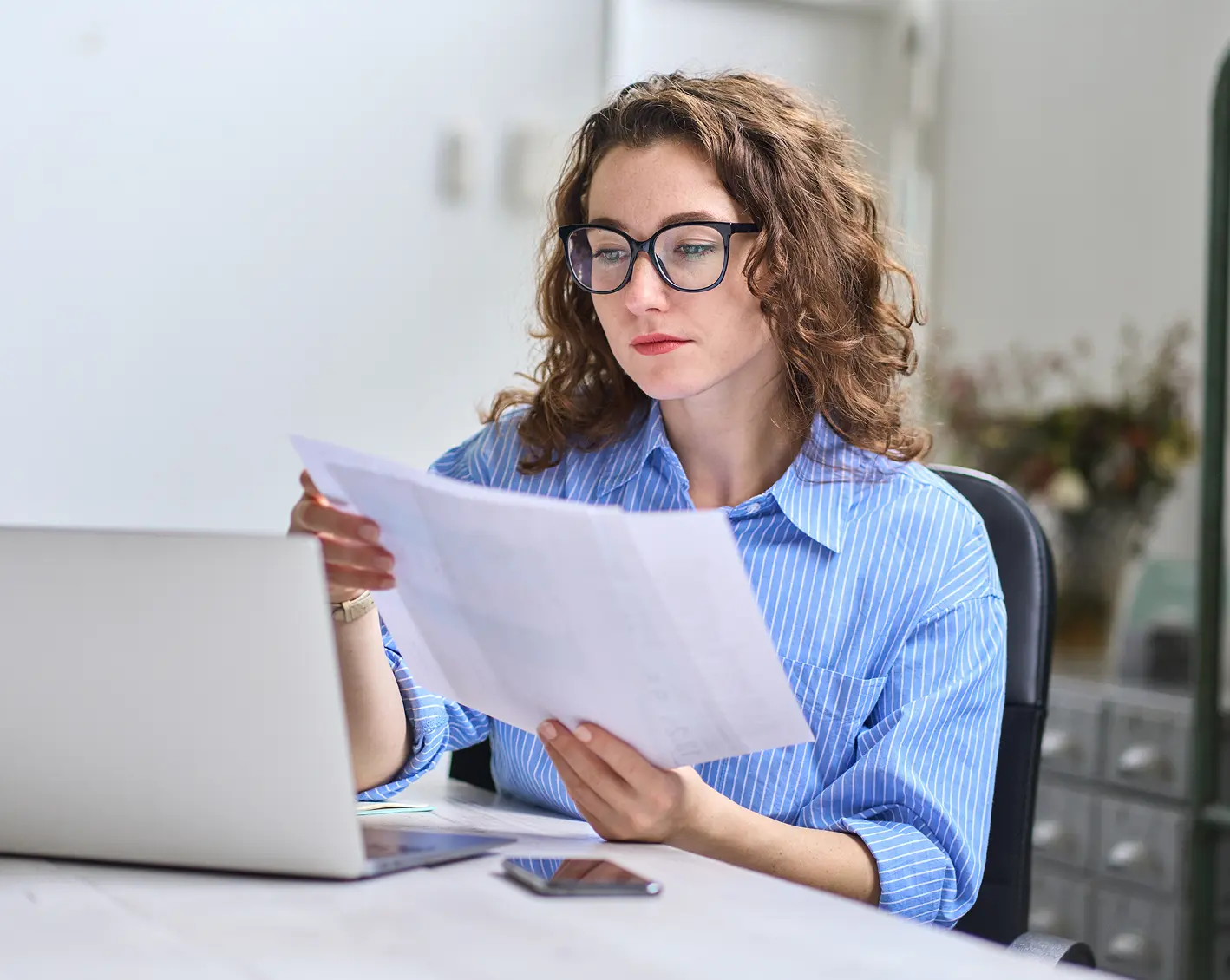 hr employee checking to make sure business and people are protected