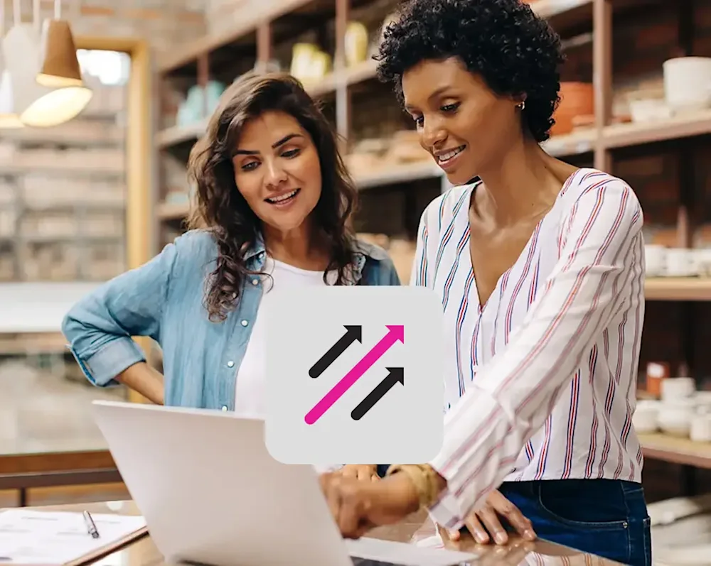 a couple of business women running payroll