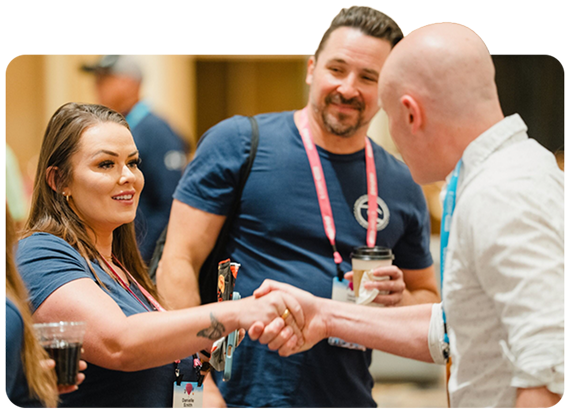 Conference attendees shaking hands