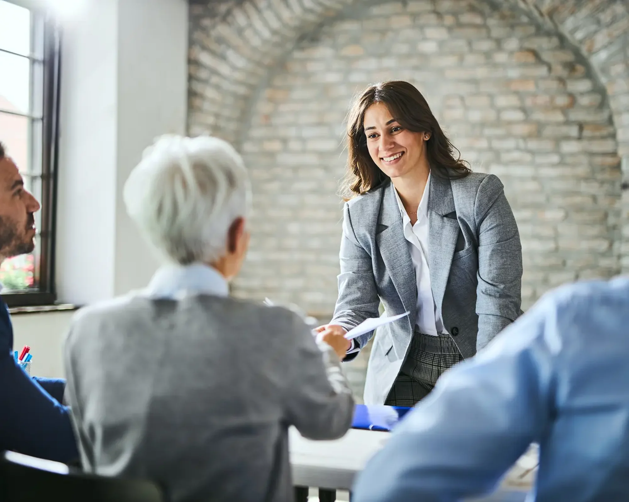 woman presenting information on hr services
