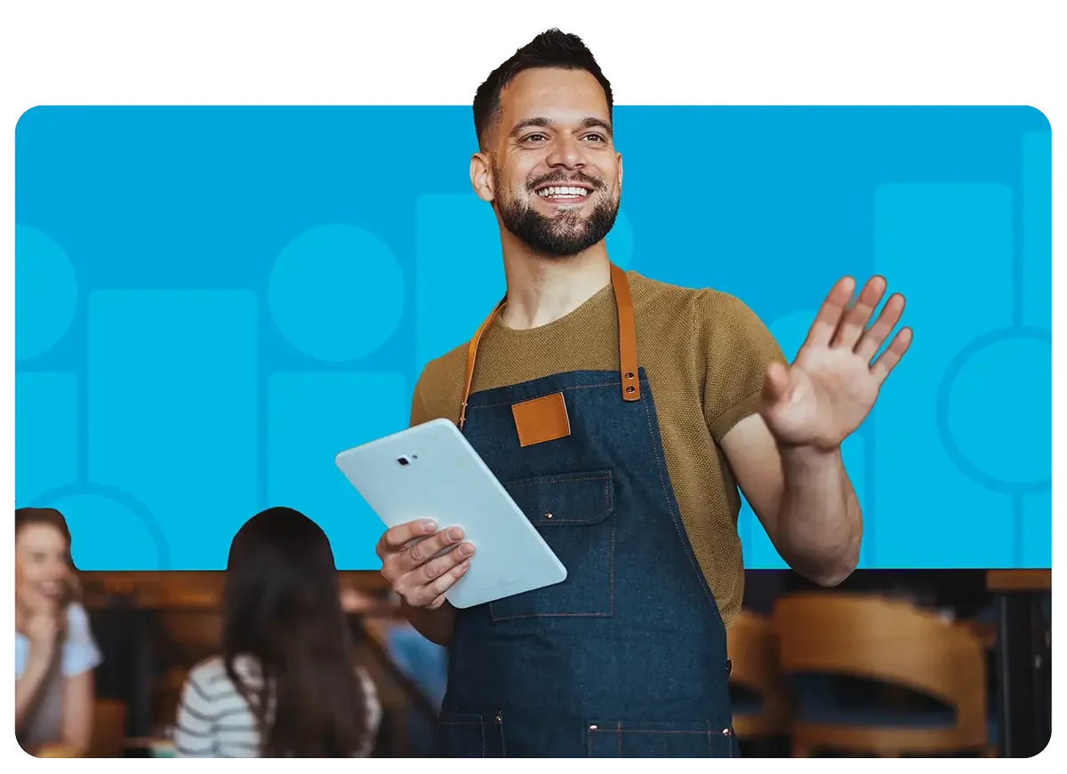 smiling restaurant employee waving to customers