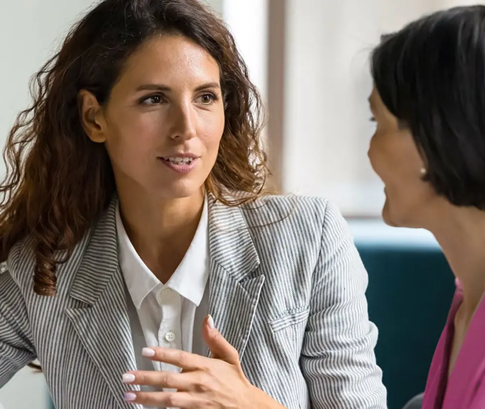 woman talking to a hiring specialist