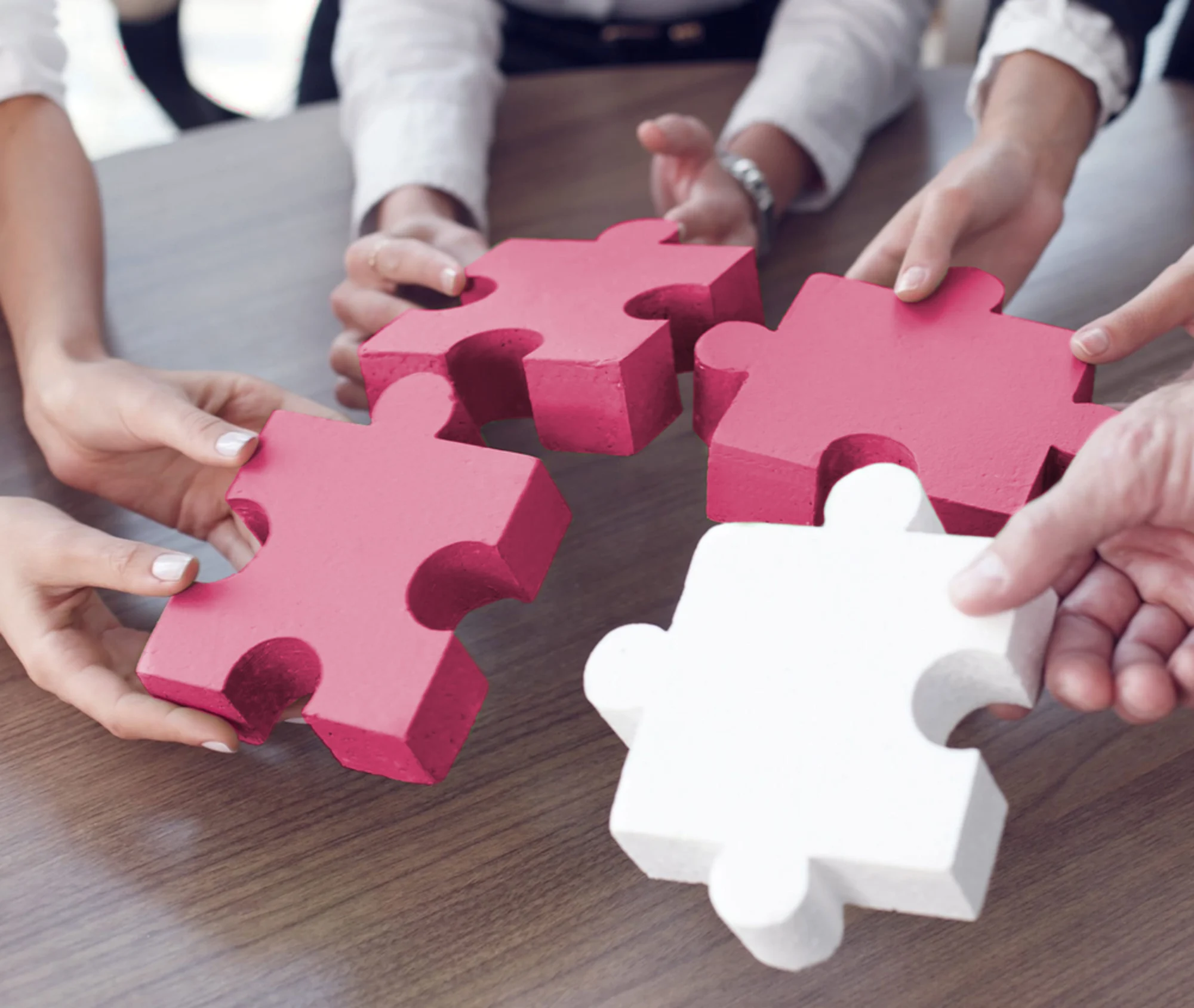 hr team fitting all the hiring puzzle pieces together