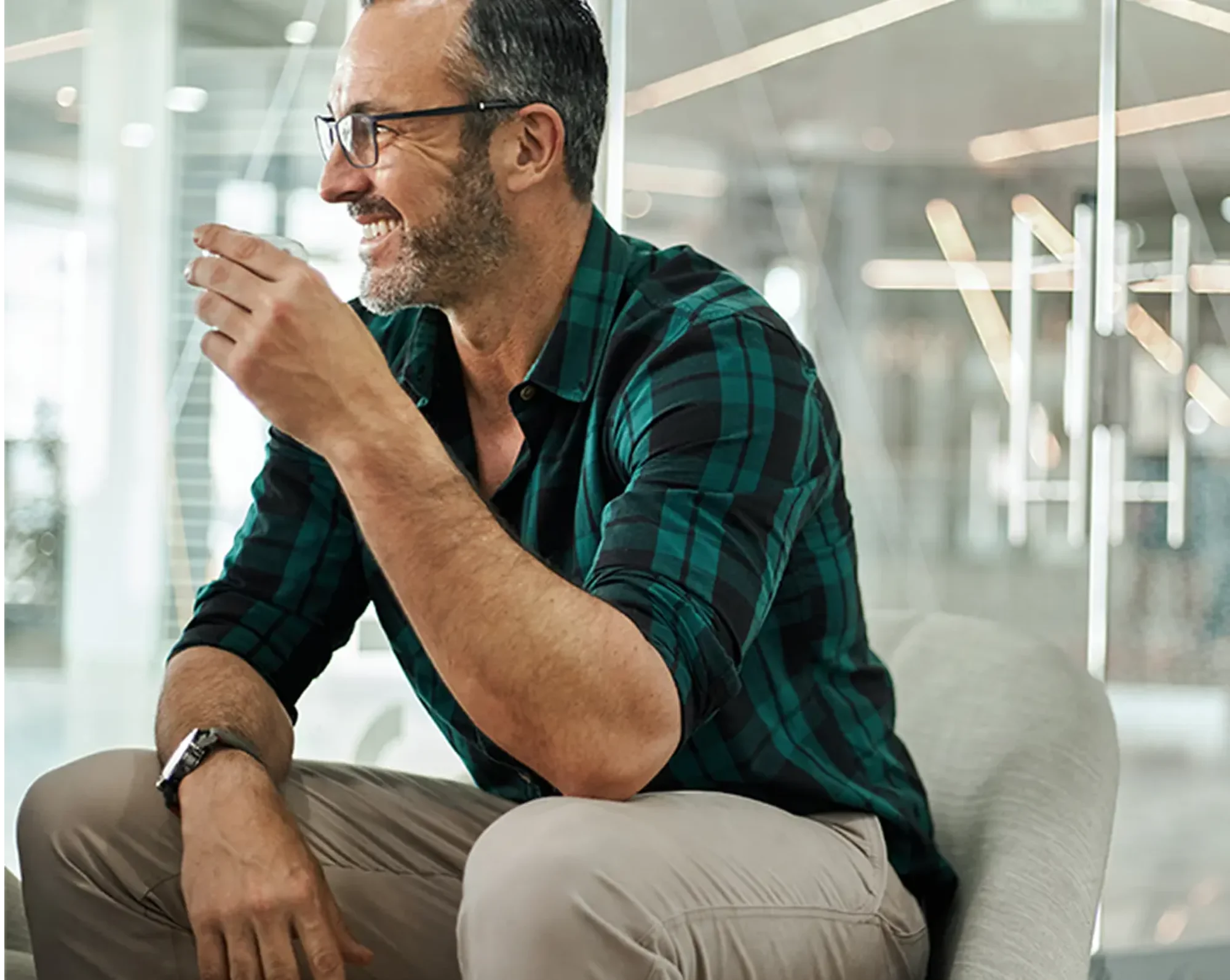 man in office smiling