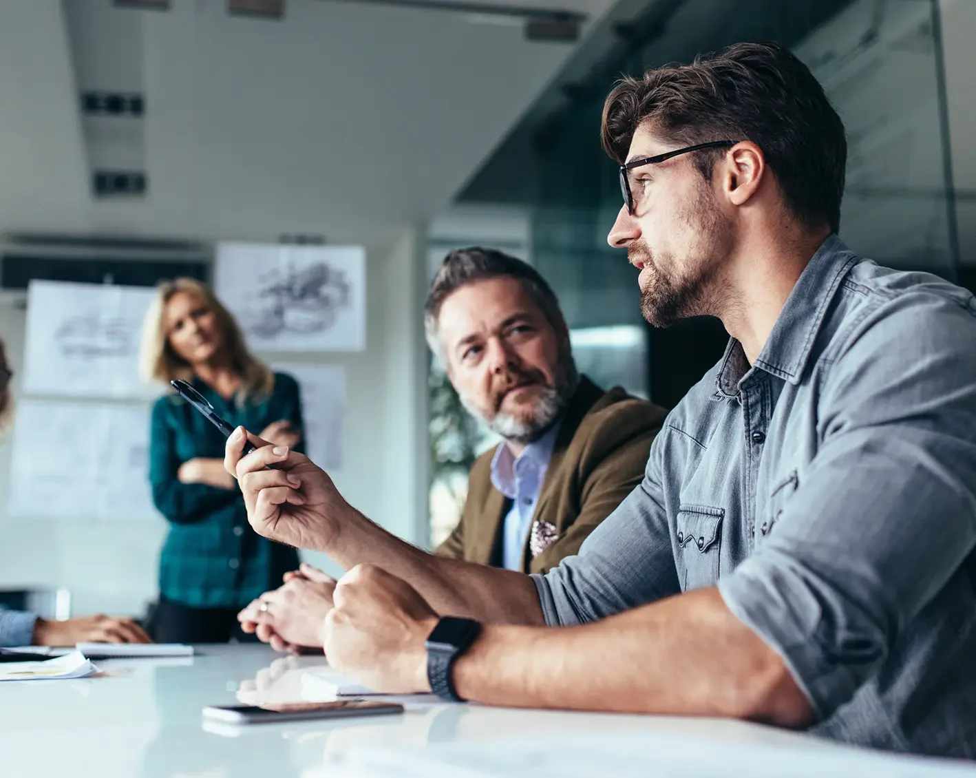 team of hr employees discussing strategies
