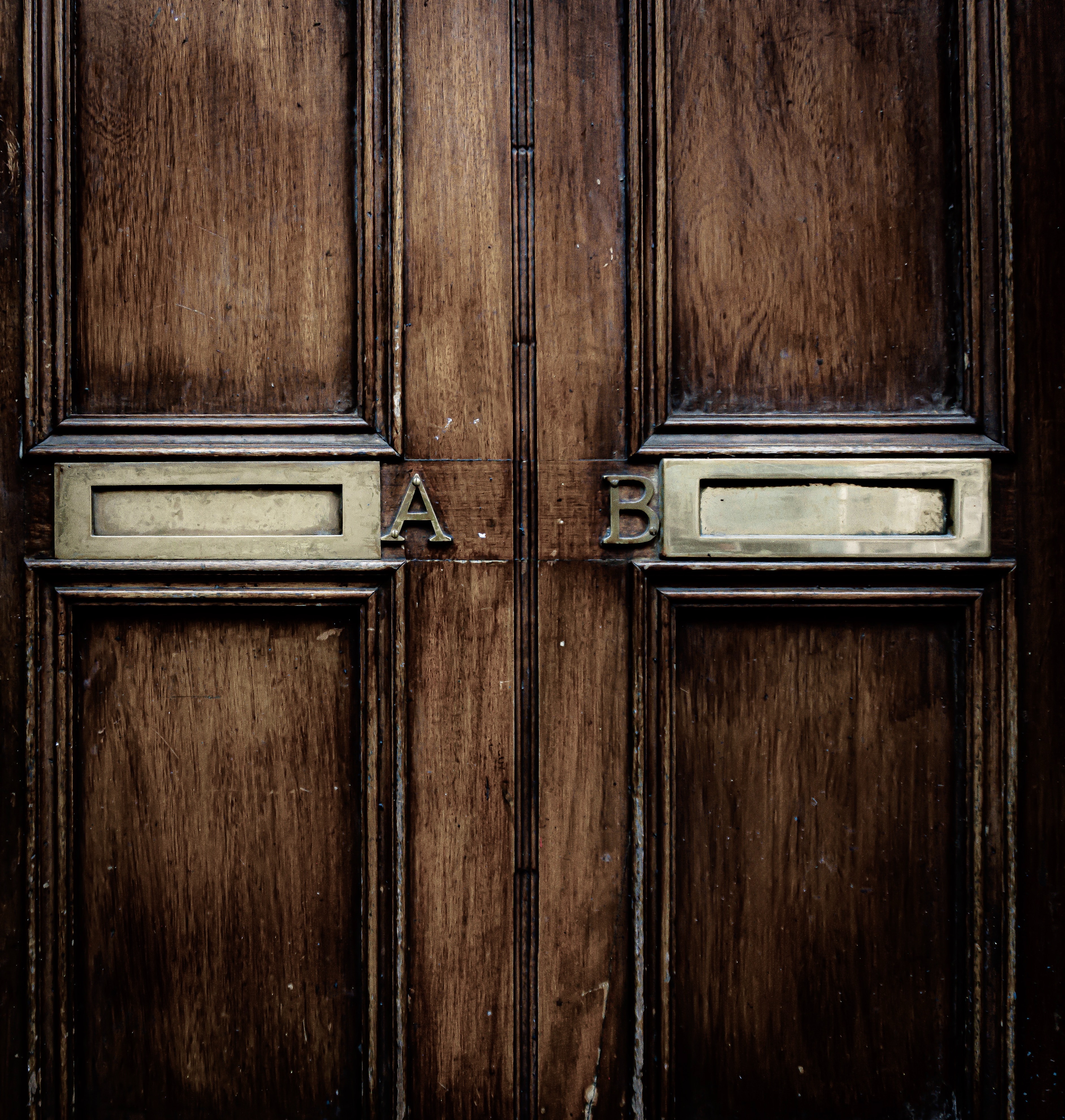 2 doors with A on the left door and B on the right