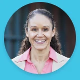 Portrait of a smiling school staff member outdoors