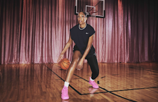 A'ja Wilson wearing the Nike A'Two basketball shoe in pink on court – signature sneaker with pearl design and Zoom Air cushioning