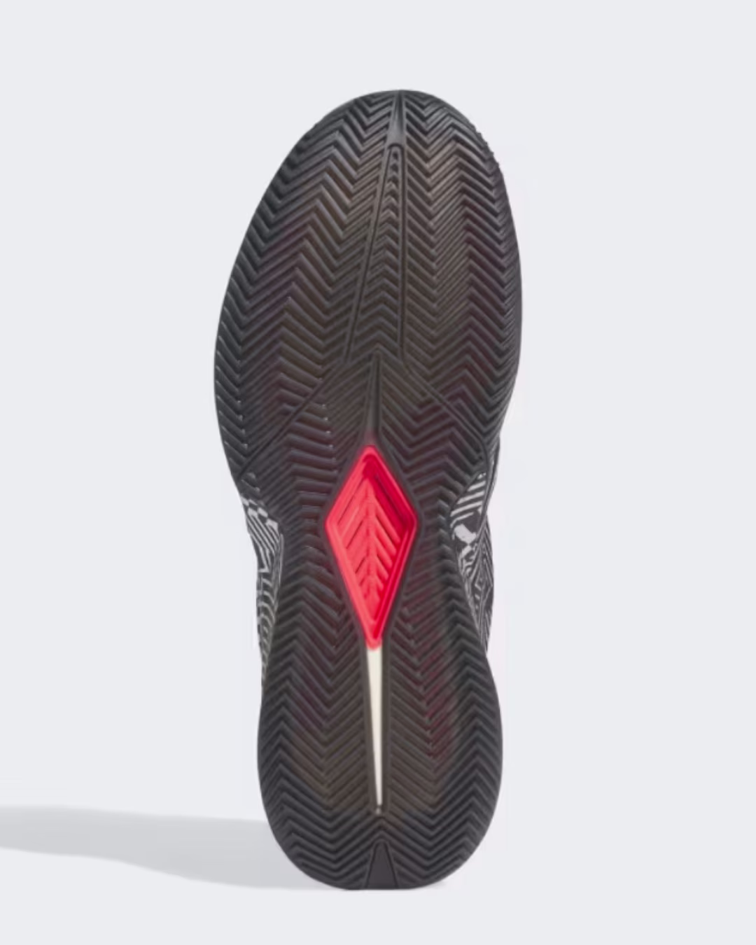 The adidas Crazy Energy+ outsole showcases an innovative herringbone chevron traction pattern in black rubber with a striking red energy pod accent in the center forefoot area. This bottom view highlights the LIGHTSTRIKE Pro cushioning technology's responsive design, featuring advanced grip patterns for multidirectional court movement and superior traction performance for explosive basketball movements.