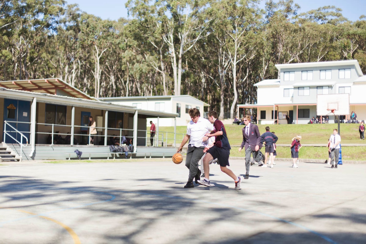 MCS student playing basketball during their study break