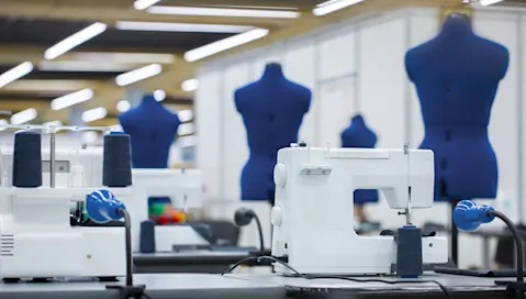 Factory with sewing machines and Mannequins.