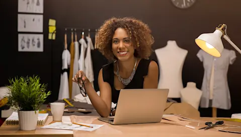 Woman in the fashion industry on her laptop.