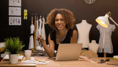 Woman in the fashion industry on her laptop.