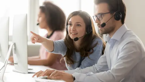 Customer service sitting in front of computer