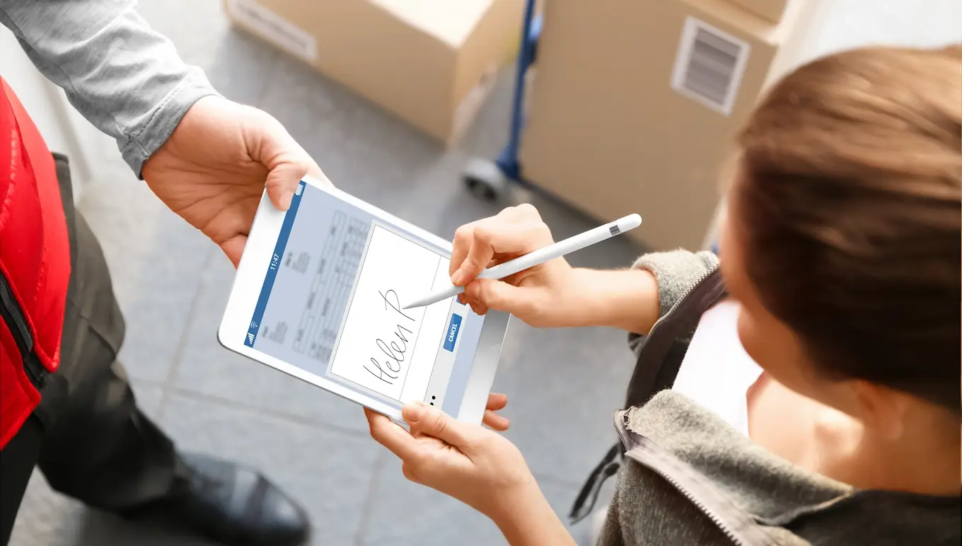 Delivery guy receiving signature from woman. Proof of delivery. 