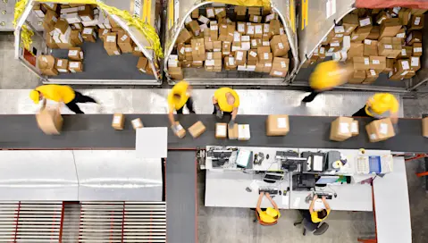 Packaged boxes on shipping assembly line