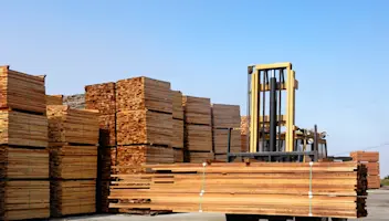 Forklift operating in lumber yard