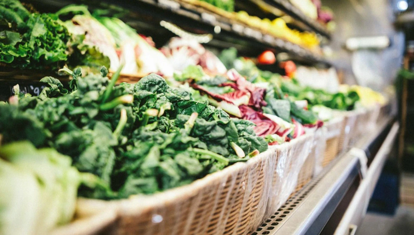 A grocery store display of fresh produce.