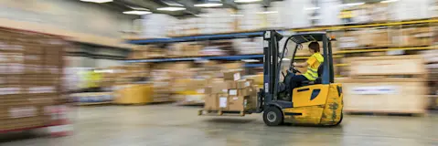 Forklift in a warehouse