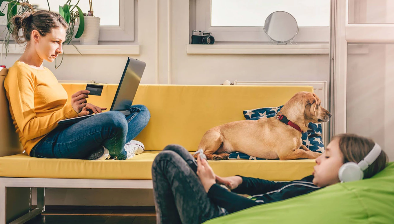 woman on couch with dog