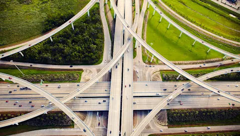Vehicles on cloverleaf highway