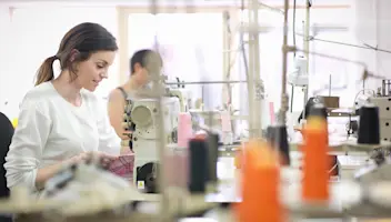 Women sewing in work room