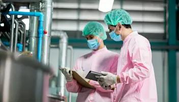 Food facility workers practice proper safety procedures.