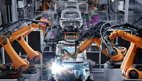 Robot arms working at factory