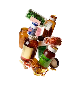 A pile of vitamin bottles