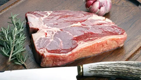 meat on wood slab