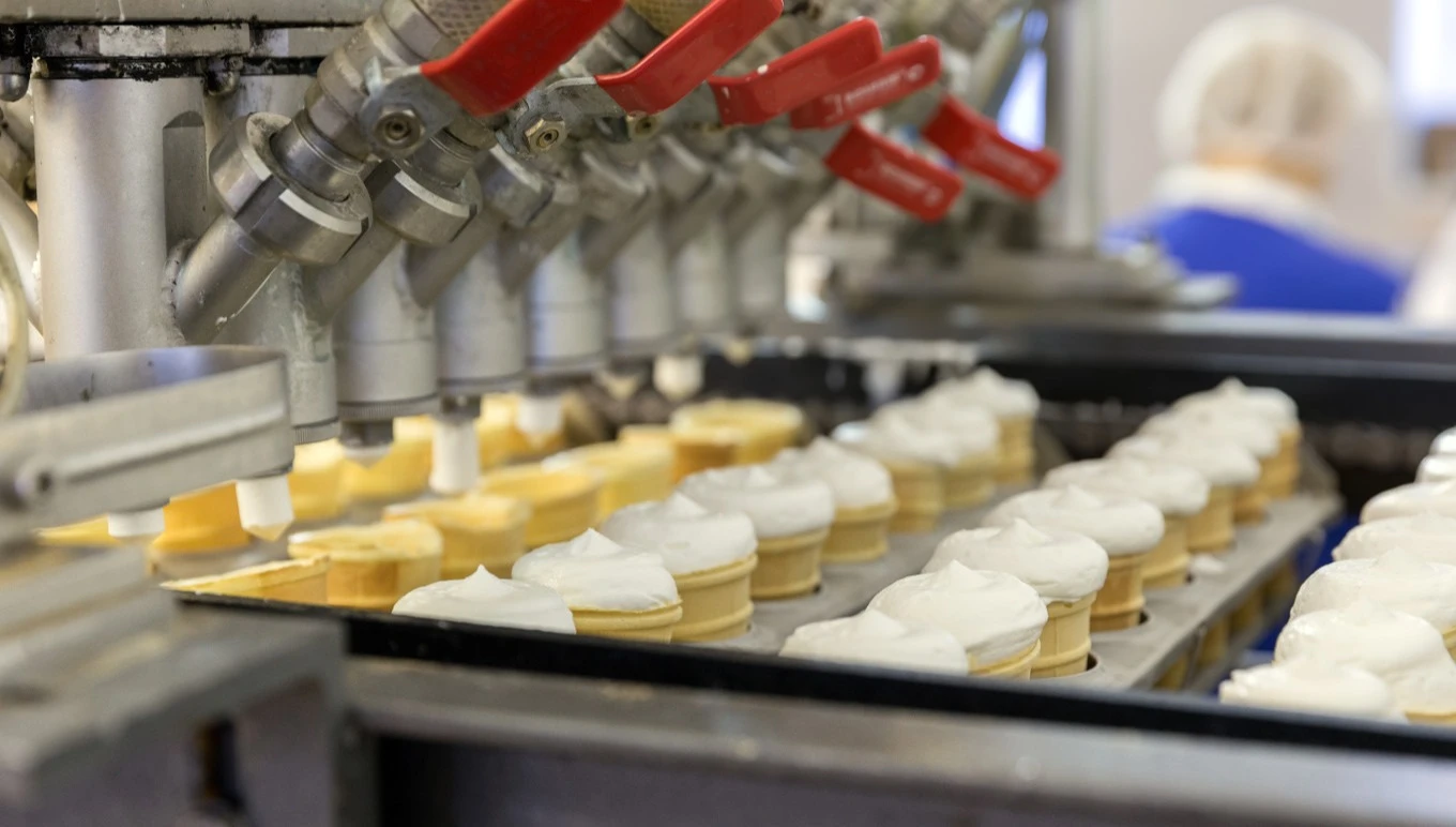 Ice cream cones on a manufacturing line.
