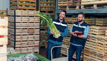 workers in fresh produce warehouse