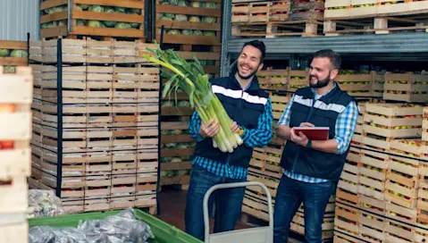 workers in fresh produce warehouse