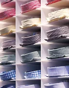Folded shirts on shelf display for retail
