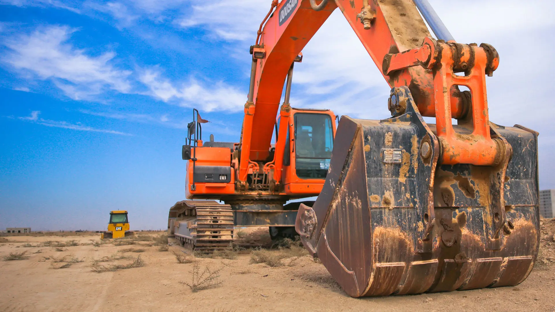 Excavateur dans le désert