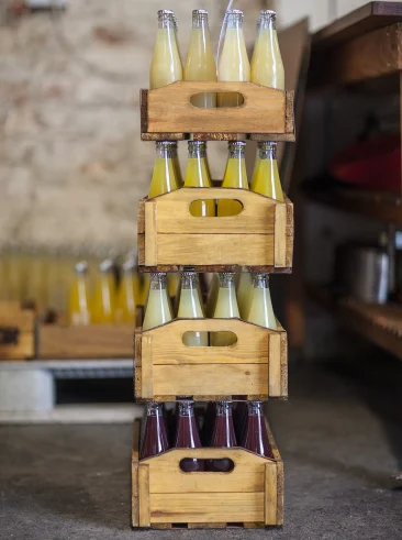 Juice bottles in crate stack