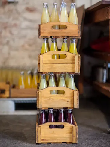 Juice bottles in crate stack