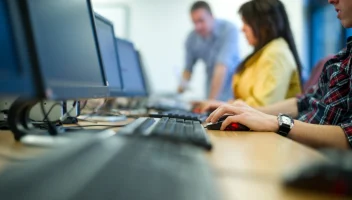 Workers using desktop computers