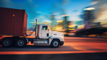 A truck follows a fully optimized route enabled by strategic route planning software.
