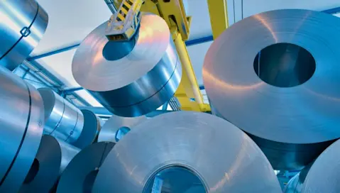 Sheet metal coils stacked in factory