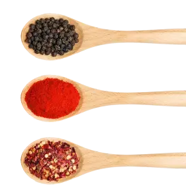 Wooden spoons containing spices