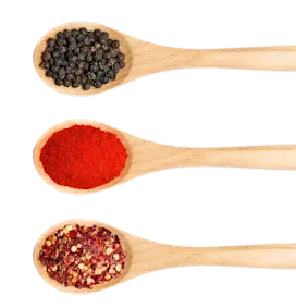 Wooden spoons containing spices