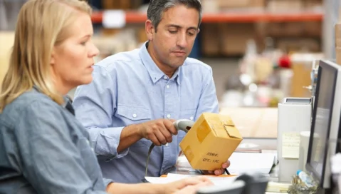 Man woman casual barcode in warehouse