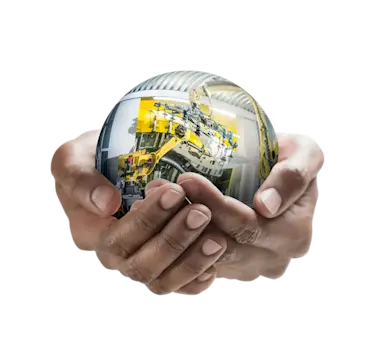 A man holding a sphere that shows factory