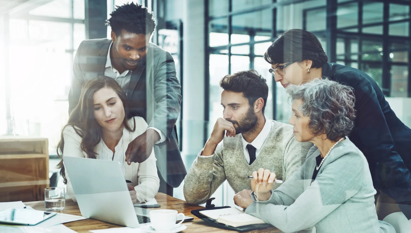 Food and beverage business professionals discuss data.