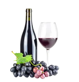 Fles en glas wijn met druiven.